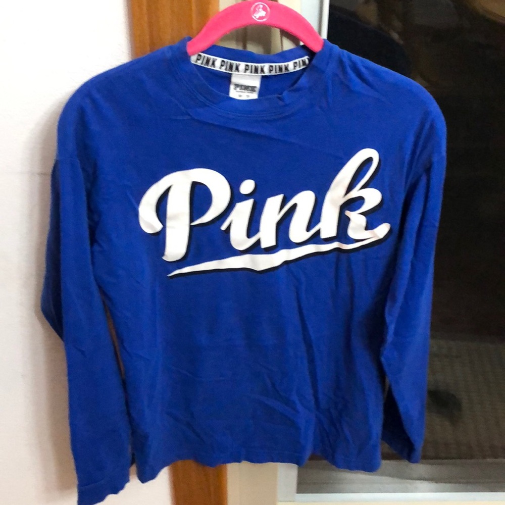 Pink logo long sleeve shirt.